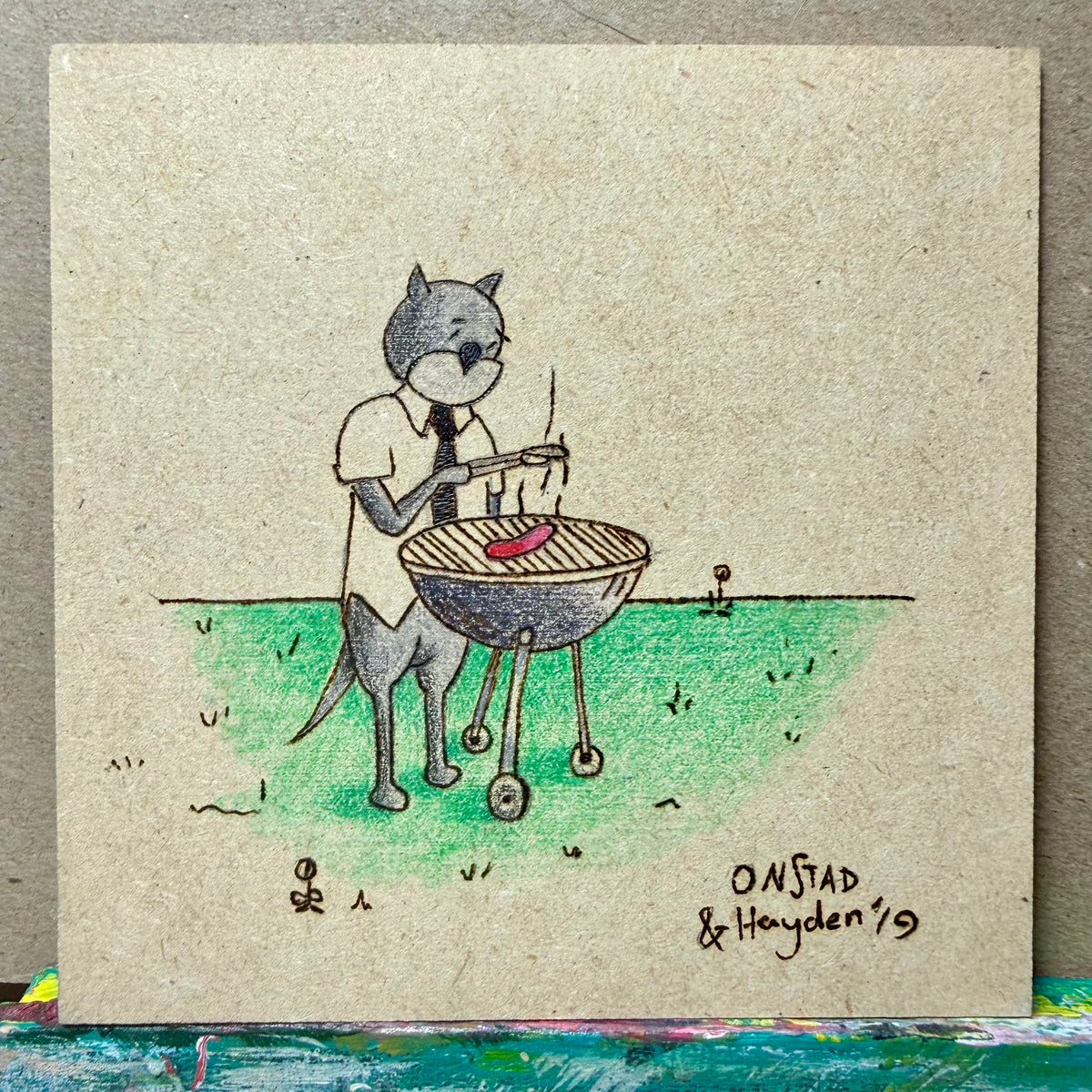 Father/Son Double-Sided Roast Beef panel, 2019, woodburn and pencils, 5"